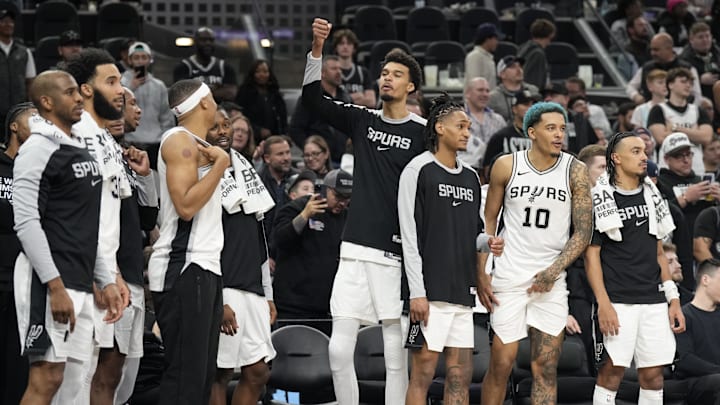 Jan 31, 2025; San Antonio, Texas, USA; San Antonio Spurs center Victor Wembanyama (1) and teammates react to a victory over the Milwaukee Bucks at Frost Bank Center.