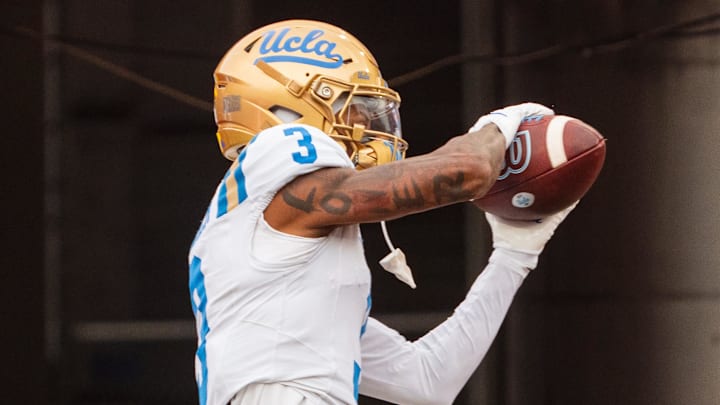 Nov 2, 2024; Lincoln, Nebraska, USA; UCLA Bruins wide receiver Kwazi Gilmer (3) warms up before a game against the Nebraska Cornhuskers at Memorial Stadium. Mandatory Credit: Dylan Widger-Imagn Images