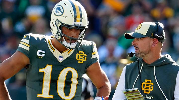 Green Bay Packers quarterback Jordan Love (10) and coach Matt LaFleur talk on the sideline against the Chicago Bears. Green Bay Packers quarterback Jordan Love (10) and coach Matt LaFleur talk on the sideline against the Chicago Bears.