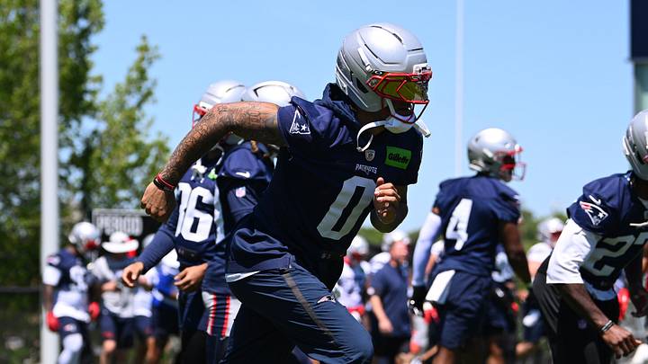Jun 9, 2026; Foxborough, MA, USA; New England Patriots cornerback Christian Gonzalez (0) warms up during minicamp at Gillette Stadium. Mandatory Credit: Eric Canha-Imagn Images