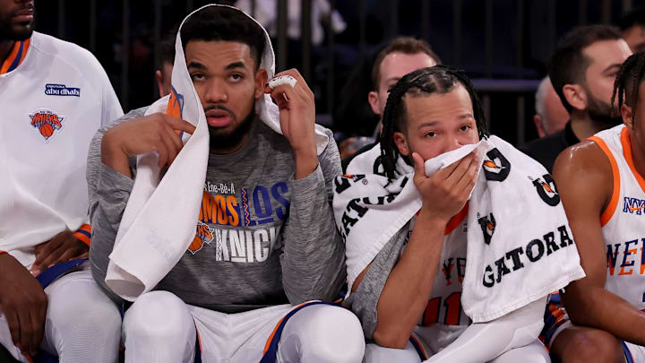 Jan 10, 2025; New York, New York, USA; New York Knicks center Karl-Anthony Towns (32) and guards Jalen Brunson (11) and Miles McBride (2) watch from the bench during the fourth quarter against the Oklahoma City Thunder at Madison Square Garden. Mandatory Credit: Brad Penner-Imagn Images