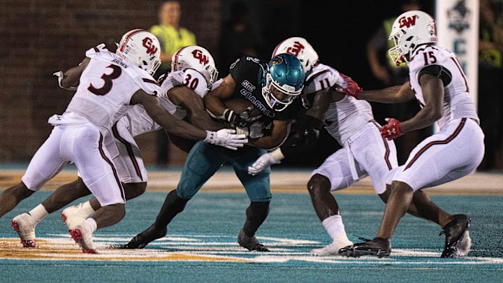 College football EDGE rushers from Gardner-Webb close in on Coastal Carolina RB College football EDGE rushers from Gardner-Webb close in on Coastal Carolina RB