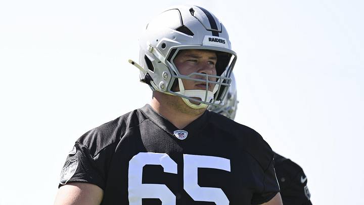 May 20, 2026; Henderson, NV, USA; Las Vegas Raiders center Tyler Linderbaum (65) warms up during organized team activities at Intermountain Health Performance Center. Mandatory Credit: Candice Ward-Imagn Images May 20, 2026; Henderson, NV, USA; Las Vegas Raiders center Tyler Linderbaum (65) warms up during organized team activities at Intermountain Health Performance Center. Mandatory Credit: Candice Ward-Imagn Images