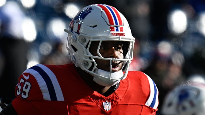 Dec 1, 2024; Foxborough, Massachusetts, USA; New England Patriots offensive tackle Vederian Lowe (59) warms up before a game against the Indianapolis Colts at Gillette Stadium. Mandatory Credit: Eric Canha-Imagn Images