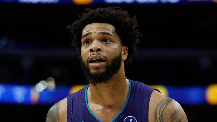 Detroit, Michigan, USA;  Charlotte Hornets forward Miles Bridges (0) reacts in the first half against the Detroit Pistons at Little Caesars Arena on Dec 20, 2025.