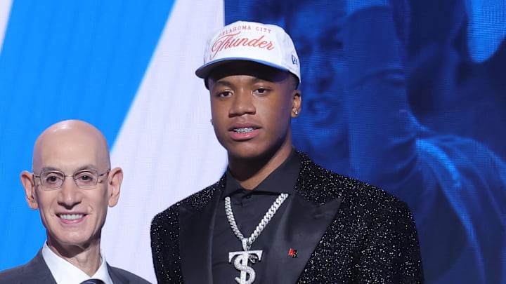 Jun 25, 2025; Brooklyn, NY, USA; Thomas Sorber stands with NBA commissioner Adam Silver after being selected as the 15th pick by the Oklahoma City Thunder in the first round of the 2025 NBA Draft at Barclays Center. Mandatory Credit: Brad Penner-Imagn Images Jun 25, 2025; Brooklyn, NY, USA; Thomas Sorber stands with NBA commissioner Adam Silver after being selected as the 15th pick by the Oklahoma City Thunder in the first round of the 2025 NBA Draft at Barclays Center. Mandatory Credit: Brad Penner-Imagn Images