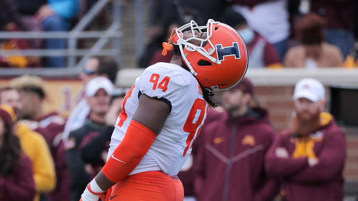 Nov 6, 2021; Minneapolis, Minnesota, USA; Illinois Fighting Illini defensive lineman Jer'Zhan Newton (94) reacts to a missed stop in the third quarter at Huntington Bank Stadium. Mandatory Credit: Matt Krohn-Imagn Images