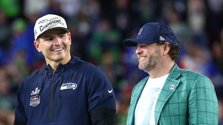 Seattle Seahawks head coach Mike Macdonald and general manager John Schneider on the podium
