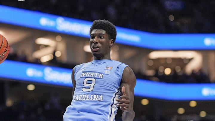 Mar 14, 2025; Charlotte, NC, USA; North Carolina Tar Heels guard Drake Powell (9) with a dunk against the Duke Blue Devils during the first half at Spectrum Center. Mandatory Credit: Jim Dedmon-Imagn Images