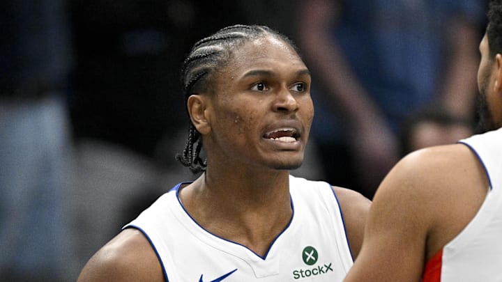 Dec 18, 2025; Dallas, Texas, USA; Detroit Pistons guard Ausar Thompson (9) is restrained by forward Tobias Harris (12) as Thompson reacts to being thrown out of the game against the Dallas Mavericks by NBA referee John Goble (not pictured) during the second quarter at the American Airlines Center. Mandatory Credit: Jerome Miron-Imagn Images Dec 18, 2025; Dallas, Texas, USA; Detroit Pistons guard Ausar Thompson (9) is restrained by forward Tobias Harris (12) as Thompson reacts to being thrown out of the game against the Dallas Mavericks by NBA referee John Goble (not pictured) during the second quarter at the American Airlines Center. Mandatory Credit: Jerome Miron-Imagn Images