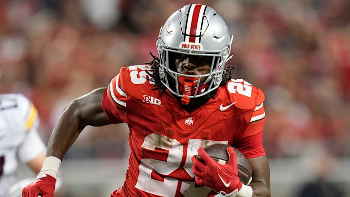 Ohio State Buckeyes running back Bo Jackson (25) runs past Minnesota Golden Gophers defensive back Za'Quan Bryan (4) during the second half of the NCAA football game at Ohio Stadium in Columbus on Oct. 4, 2025. Ohio State won 42-3. Ohio State Buckeyes running back Bo Jackson (25) runs past Minnesota Golden Gophers defensive back Za'Quan Bryan (4) during the second half of the NCAA football game at Ohio Stadium in Columbus on Oct. 4, 2025. Ohio State won 42-3.