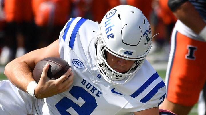 Sep 12, 2026; Champaign, Illinois, USA; Illinois Fighting Illini defensive lineman Pat Farrell (52) brings down Duke Blue Devils quarterback Walker Eget (2) during the first half at Gies Memorial Stadium. Mandatory Credit: Ron Johnson-Imagn Images Sep 12, 2026; Champaign, Illinois, USA; Illinois Fighting Illini defensive lineman Pat Farrell (52) brings down Duke Blue Devils quarterback Walker Eget (2) during the first half at Gies Memorial Stadium. Mandatory Credit: Ron Johnson-Imagn Images