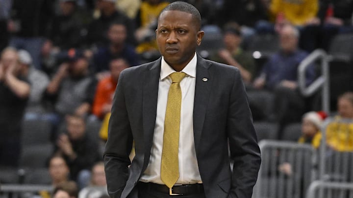 Dec 22, 2022; St. Louis, Missouri, USA;  Missouri Tigers head coach Dennis Gates looks on during the first half against the Illinois Fighting Illini at Enterprise Center. Mandatory Credit: Jeff Curry-Imagn Images