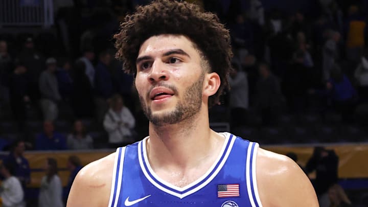 Feb 10, 2026; Pittsburgh, Pennsylvania, USA;  Duke Blue Devils forward Cameron Boozer (12) exits the court after defeating the Pittsburgh Panthers at Petersen Events Center. Mandatory Credit: Charles LeClaire-Imagn Images