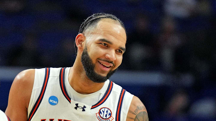 Mar 20, 2025; Lexington, KY, USA;  Auburn Tigers forward Johni Broome (4) reacts during the second half against the Alabama State Hornets in the first round of the NCAA Tournament at Rupp Arena. Mandatory Credit: Aaron Doster-Imagn Images