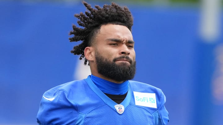 May 28, 2025; Woodland Hills, CA, USA; Los Angeles Rams running back Kyren Williams (23) runs out to the practice field during organized team activities at Rams Practice Facility. 