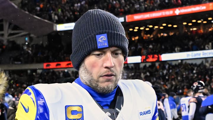 Jan 18, 2026; Chicago, IL, USA; Los Angeles Rams quarterback Matthew Stafford (9) holds a game ball as he is interviewed by NBC sideline reporter Melissa Stark after a NFC Divisional Round game against the Chicago Bears at Soldier Field. Mandatory Credit: Matt Marton-Imagn Images