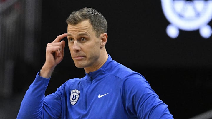 Jan 6, 2026; Louisville, Kentucky, USA;  Duke Blue Devils head coach Jon Scheyer reacts during the second half against the Louisville Cardinals at KFC Yum! Center. Duke defeated Louisville 84-73. Mandatory Credit: Jamie Rhodes-Imagn Images