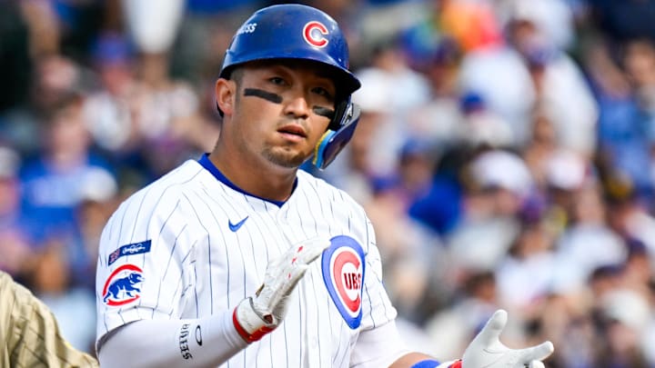 Oct 1, 2025; Chicago, Illinois, USA; Chicago Cubs outfielder Seiya Suzuki (27) reacts after hitting a double in the fourth inning against the San Diego Padres during game two of the Wildcard round for the 2025 MLB playoffs at Wrigley Field. Mandatory Credit: Matt Marton-Imagn Images