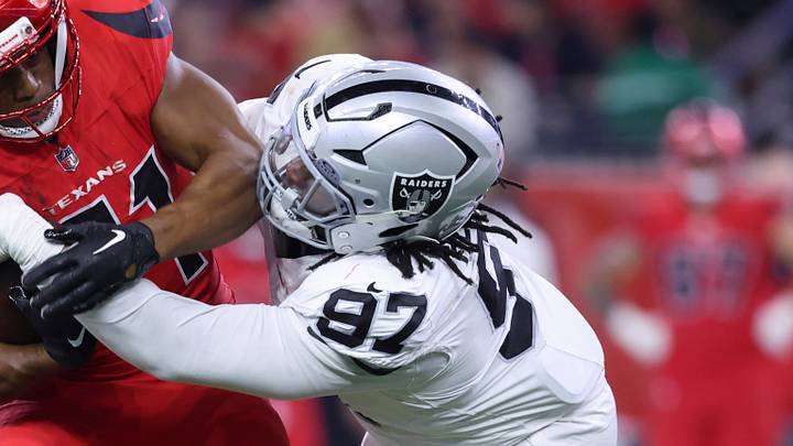 Dec 21, 2025; Houston, Texas, USA; Houston Texans running back Nick Chubb (21) runs with the ball as Las Vegas Raiders defensive tackle Tonka Hemingway (97) makes a tackle during the fourth quarter at NRG Stadium. Mandatory Credit: Troy Taormina-Imagn Images Dec 21, 2025; Houston, Texas, USA; Houston Texans running back Nick Chubb (21) runs with the ball as Las Vegas Raiders defensive tackle Tonka Hemingway (97) makes a tackle during the fourth quarter at NRG Stadium. Mandatory Credit: Troy Taormina-Imagn Images