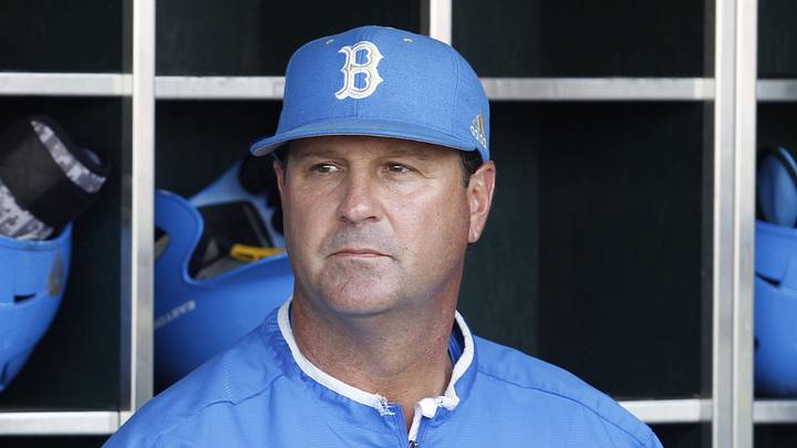 Jun 24, 2013; Omaha, NE, USA; UCLA Bruins head coach John Savage (22) looks on in the dugout before game 1 of the College World Series finals against the Mississippi State Bulldogs at TD Ameritrade Park. Mandatory Credit: Bruce Thorson-Imagn Images
