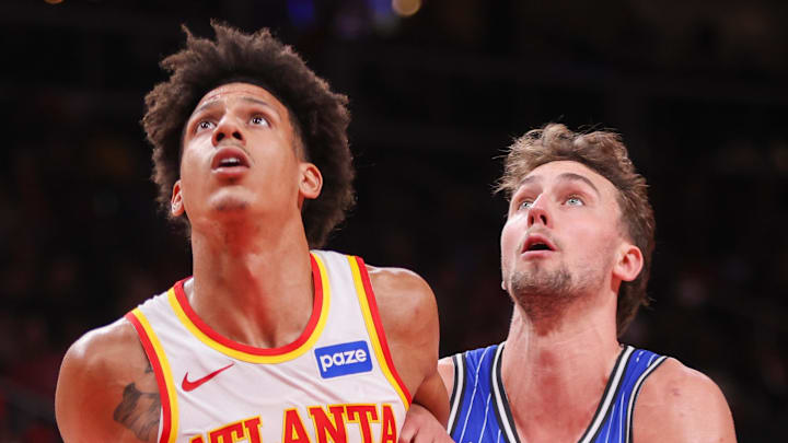 Atlanta Hawks forward Jalen Johnson boxes out Orlando Magic forward Franz Wagner.