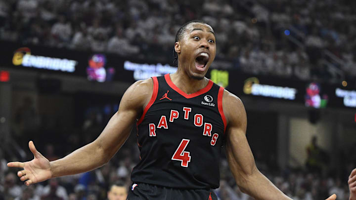 Apr 29, 2026; Cleveland, Ohio, USA; Toronto Raptors forward Scottie Barnes (4) and forward Sandro Mamukelashvili (54) react against the Cleveland Cavaliers in the first quarter of game five of the first round of the 2026 NBA Playoffs at Rocket Arena. Mandatory Credit: David Richard-Imagn Images