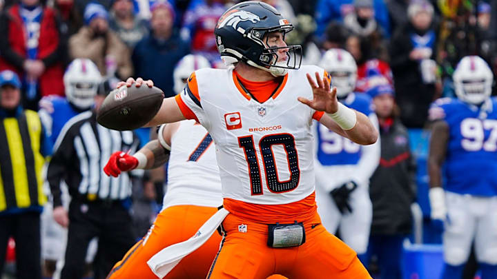 Denver Broncos quarterback Bo Nix (10) throws a. Pass during the first half of the Buffalo Bills wild card game against the Denver Broncos at Highmark Stadium in Orchard Park on Jan. 12, 2025.