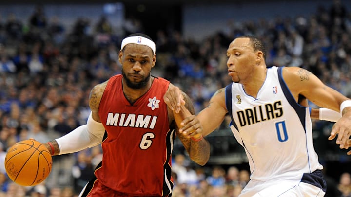 Dec 25, 2011; Dallas, TX, USA; Miami Heat small forward LeBron James (6) dribbles past a defending Dallas Mavericks small forward Shawn Marion (0) during the fourth quarter at the American Airlines Center. The Heat defeated the Mavericks 105-94. Mandatory Credit: Jerome Miron-Imagn Images Dec 25, 2011; Dallas, TX, USA; Miami Heat small forward LeBron James (6) dribbles past a defending Dallas Mavericks small forward Shawn Marion (0) during the fourth quarter at the American Airlines Center. The Heat defeated the Mavericks 105-94. Mandatory Credit: Jerome Miron-Imagn Images