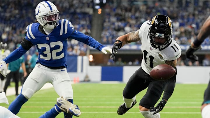 Jacksonville Jaguars wide receiver Parker Washington (11) fumbles the ball before recovering it and scoring a touchdown Sunday, Jan. 5, 2025, during a game against the Indianapolis Colts at Lucas Oil Stadium in Indianapolis. Jacksonville Jaguars wide receiver Parker Washington (11) fumbles the ball before recovering it and scoring a touchdown Sunday, Jan. 5, 2025, during a game against the Indianapolis Colts at Lucas Oil Stadium in Indianapolis.