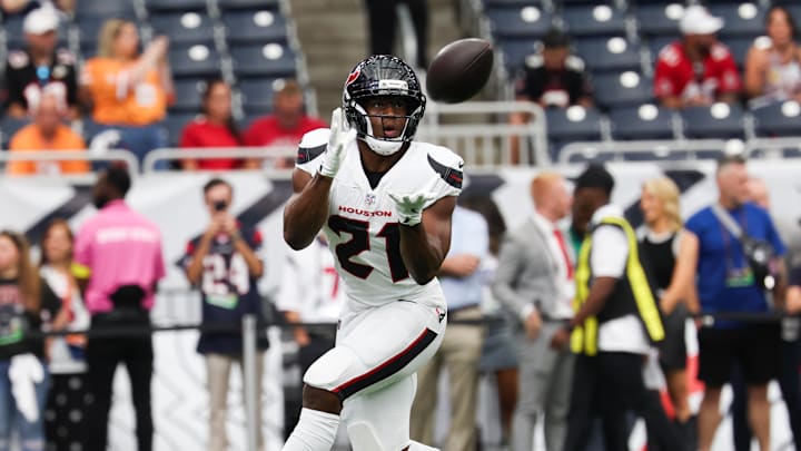 Sep 15, 2025; Houston, Texas, USA;  Houston Texans running back Nick Chubb (21) warms up before the game against the Tampa Bay Buccaneers at NRG Stadium. Mandatory Credit: Thomas Shea-Imagn Images