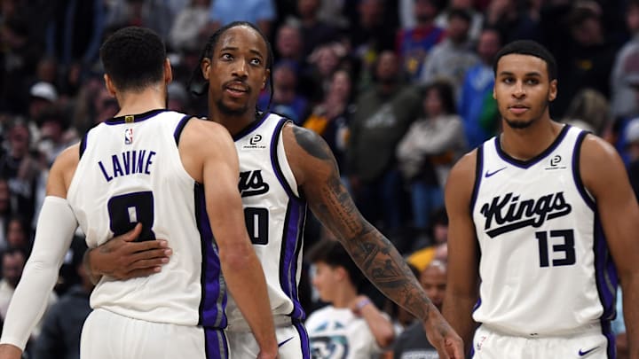 Nov 22, 2025; Denver, Colorado, USA; Sacramento Kings guard DeMar DeRozan (10) celebrates with guard Zach LaVine (8) after a made shot late in the second half of a win against the Denver Nuggets at Ball Arena.