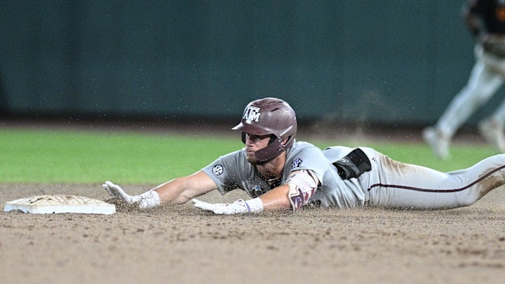 Texas A&M Aggies third baseman Gavin Grahovac (9) slides into second base with a double to lead off.