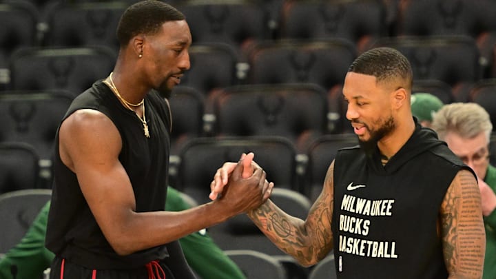 Oct 30, 2023; Milwaukee, Wisconsin, USA; Miami Heat center Bam Adebayo (13) greets Milwaukee Bucks guard Damian Lillard (0) before the game at Fiserv Forum. Mandatory Credit: Benny Sieu-Imagn Images