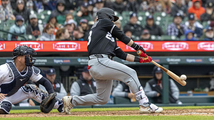 Chicago White Sox outfielder Andrew Benintendi (23) hits against the Detroit Tigers at Comerica Park. Chicago White Sox outfielder Andrew Benintendi (23) hits against the Detroit Tigers at Comerica Park.
