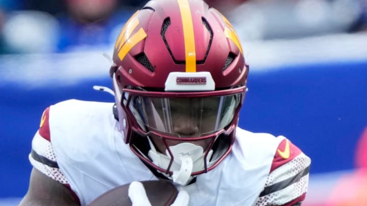 Washington Commanders running back Jacory Croskey-Merritt runs against the Giants defense. Washington Commanders running back Jacory Croskey-Merritt runs against the Giants defense.