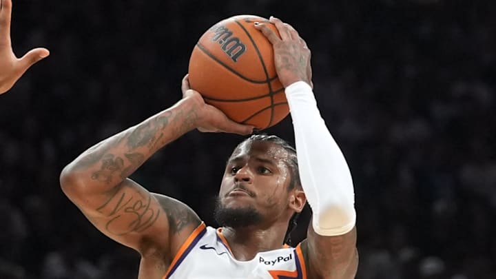 Feb 19, 2026; Austin, Texas, USA; Phoenix Suns guard Jalen Green (4) shoots over San Antonio Spurs guard Dylan Harper (2) during the second half at Moody Center. Mandatory Credit: Scott Wachter-Imagn Images