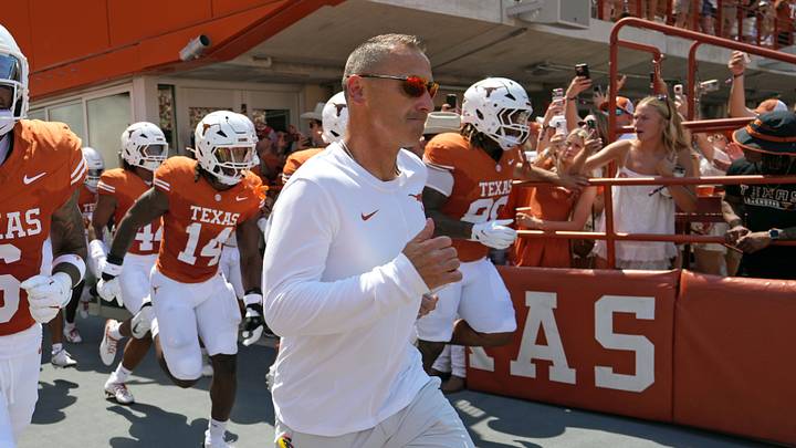 Texas Longhorns Head Coach Steve Sarkisian leads his team on to the field before a game against the Texas State Bobcats at Darrell K Royal-Texas Memorial Stadium. Texas Longhorns Head Coach Steve Sarkisian leads his team on to the field before a game against the Texas State Bobcats at Darrell K Royal-Texas Memorial Stadium.