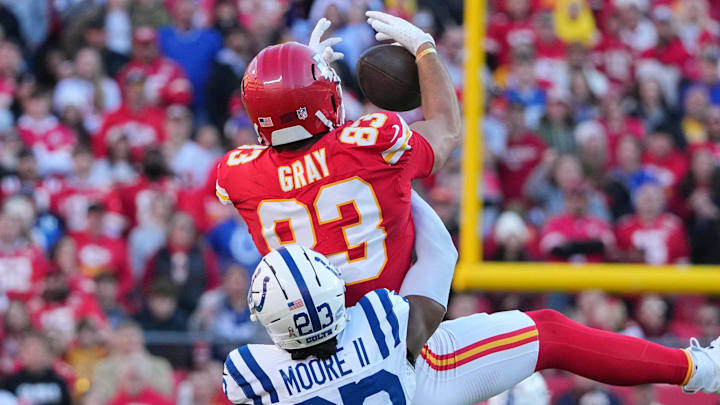 Nov 23, 2025; Kansas City, Missouri, USA; Kansas City Chiefs tight end Noah Gray (83) makes a catch against Indianapolis Colts cornerback Kenny Moore II (23) in the second half  at GEHA Field at Arrowhead Stadium. Mandatory Credit: Denny Medley-Imagn Images