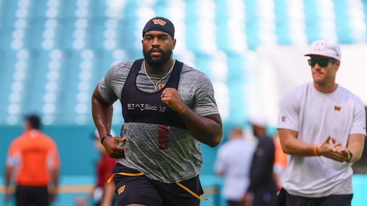Aug 17, 2024; Miami Gardens, Florida, USA; Washington Commanders defensive tackle Jonathan Allen (93) warms up before a preseason game against the Miami Dolphins at Hard Rock Stadium. Mandatory Credit: Sam Navarro-Imagn Images