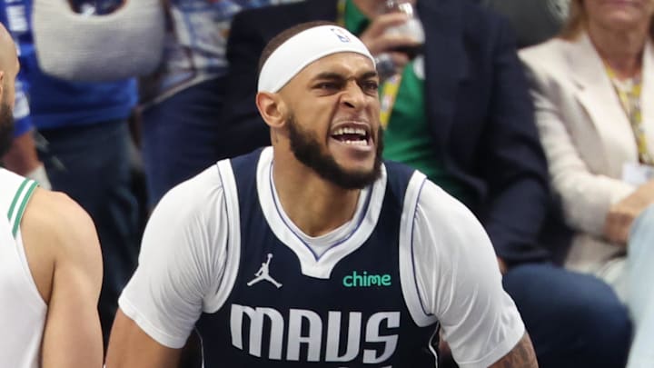 Dallas Mavericks center Daniel Gafford (21) reacts after dunking the ball against the Boston Celtics during the second half of game four of the 2024 NBA Finals at American Airlines Center. 
