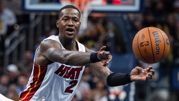 Nov 15, 2024; Indianapolis, Indiana, USA; Miami Heat guard Terry Rozier (2) passes the ball while Indiana Pacers guard Bennedict Mathurin (00) defends in the second half at Gainbridge Fieldhouse. Mandatory Credit: Trevor Ruszkowski-Imagn Images