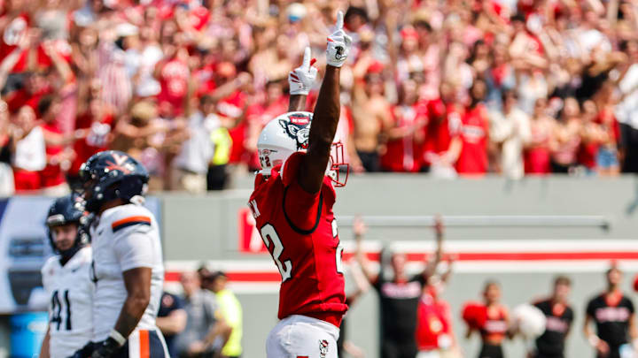Sep 6, 2025; Raleigh, North Carolina, USA; North Carolina State Wolfpack cornerback Jackson Vick (22) celebrates a down during the second half of the game against Virginia Cavaliers at Carter-Finley Stadium. Mandatory Credit: Jaylynn Nash-Imagn Images Sep 6, 2025; Raleigh, North Carolina, USA; North Carolina State Wolfpack cornerback Jackson Vick (22) celebrates a down during the second half of the game against Virginia Cavaliers at Carter-Finley Stadium. Mandatory Credit: Jaylynn Nash-Imagn Images