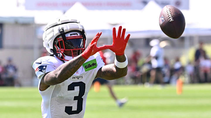 Jul 28, 2025; Foxborough, MA, USA; New England Patriots wide receiver DeMario Douglas (3) catches the ball during training camp at Gillette Stadium. Mandatory Credit: Eric Canha-Imagn Images