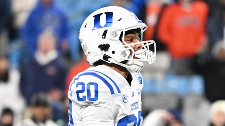 Dec 6, 2025; Charlotte, NC, USA; Duke Blue Devils running back Nate Sheppard (20) runs the ball for a touchdown in the second quarter against the Virginia Cavaliers during the 2025 ACC Championship game at Bank of America Stadium. Mandatory Credit: Bob Donnan-Imagn Images