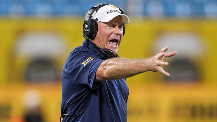 Sep 19, 2026; Charlotte, North Carolina, USA; West Virginia Mountaineers head coach Rich Rodriguez yells on the sideline during the second quarter against the Virginia Cavaliers at Bank of America Stadium. Mandatory Credit: Ben Queen-Imagn Images Sep 19, 2026; Charlotte, North Carolina, USA; West Virginia Mountaineers head coach Rich Rodriguez yells on the sideline during the second quarter against the Virginia Cavaliers at Bank of America Stadium. Mandatory Credit: Ben Queen-Imagn Images