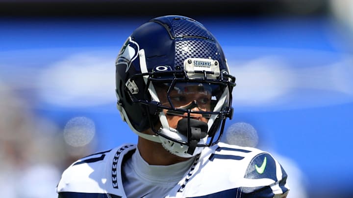 Seattle Seahawks wide receiver Jaxon Smith-Njigba rushes for yards during the second quarter. Seattle Seahawks wide receiver Jaxon Smith-Njigba rushes for yards during the second quarter.
