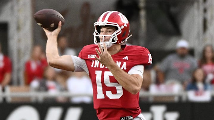 Oct 18, 2025; Bloomington, Indiana, USA; Indiana Hoosiers quarterback Fernando Mendoza (15) throws a pass during the second half against the Michigan State Spartans at Memorial Stadium. Mandatory Credit: Robert Goddin-Imagn Images