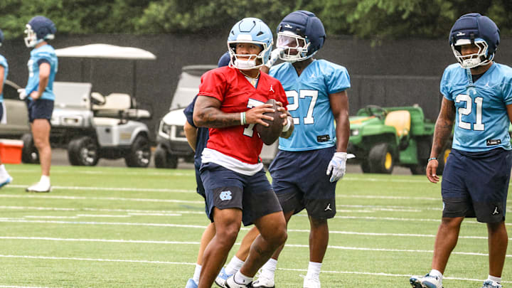 North Carolina quarterback Gio Lopez (7) dropping back to pass at practice at the Koman Practice Complex on Aug. 2, 2025. North Carolina quarterback Gio Lopez (7) dropping back to pass at practice at the Koman Practice Complex on Aug. 2, 2025.