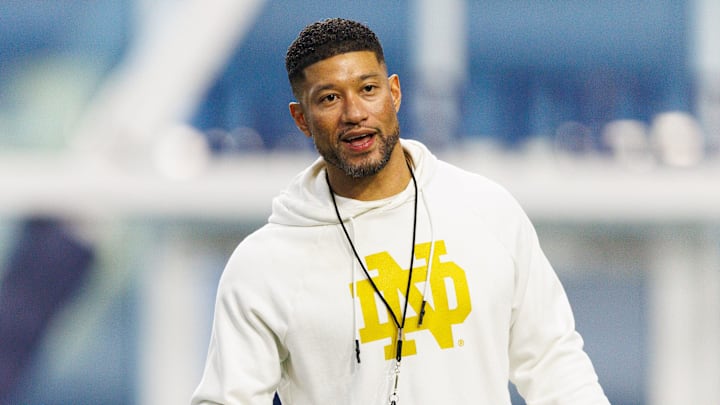 Head coach Marcus Freeman greets his players during a Notre Dame football practice at Irish Athletic Center on Friday, March 20, 2026, in South Bend.